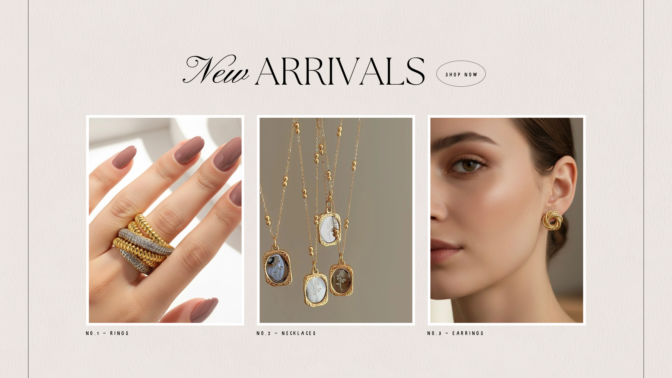 Jewelry display with rings, necklaces, and earrings on a neutral background.