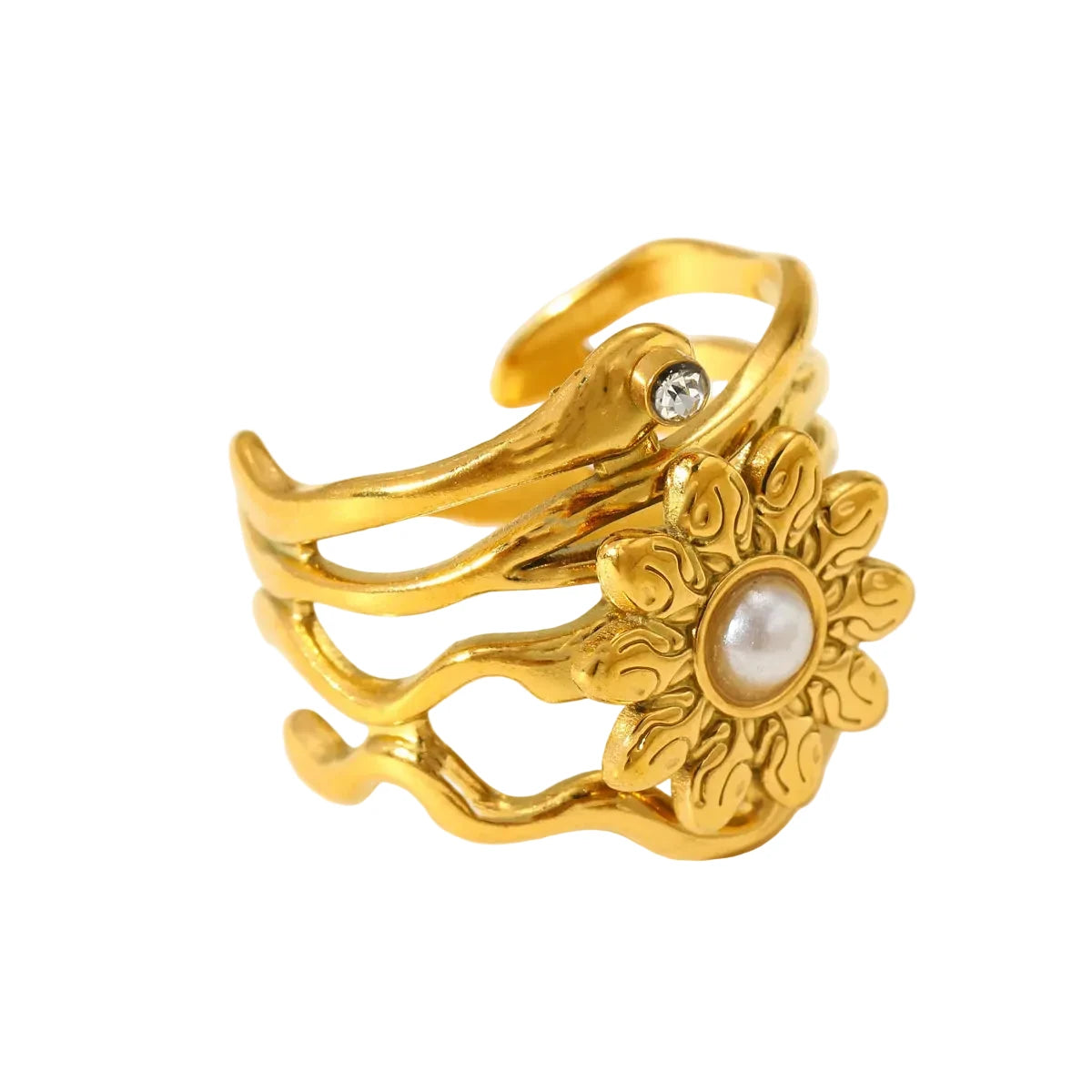 Gold ring with floral design and pearl center on a white background